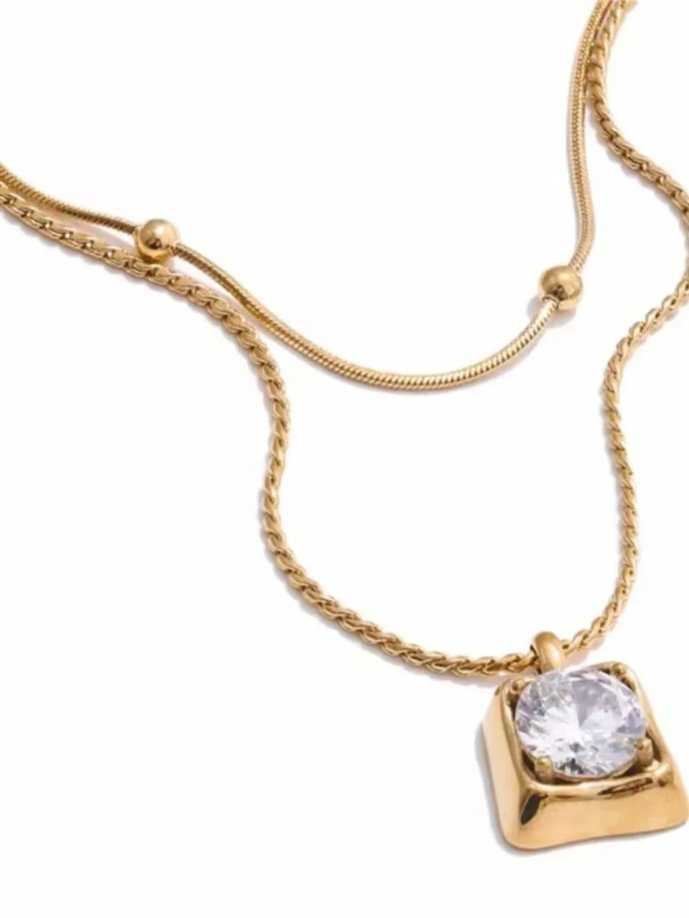 Gold Toned Pendant Necklace with Clear Stone